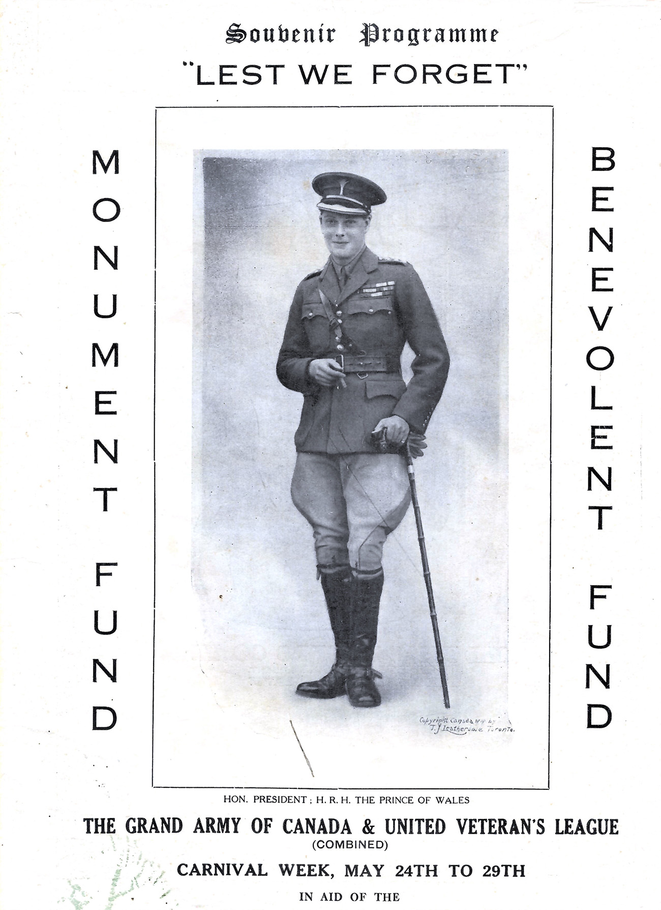 Poster advertising the Souvenir programme “Lest We Forget” for The Grand Army of Canada & United Veteran’s League, dated ‘carnival week’ may 24th to 29th. Photograph of officer in uniform leaning on cane with cigar in hand, with ‘Monument Fund’ and ‘Benevolent Fund’ written on either side of him.