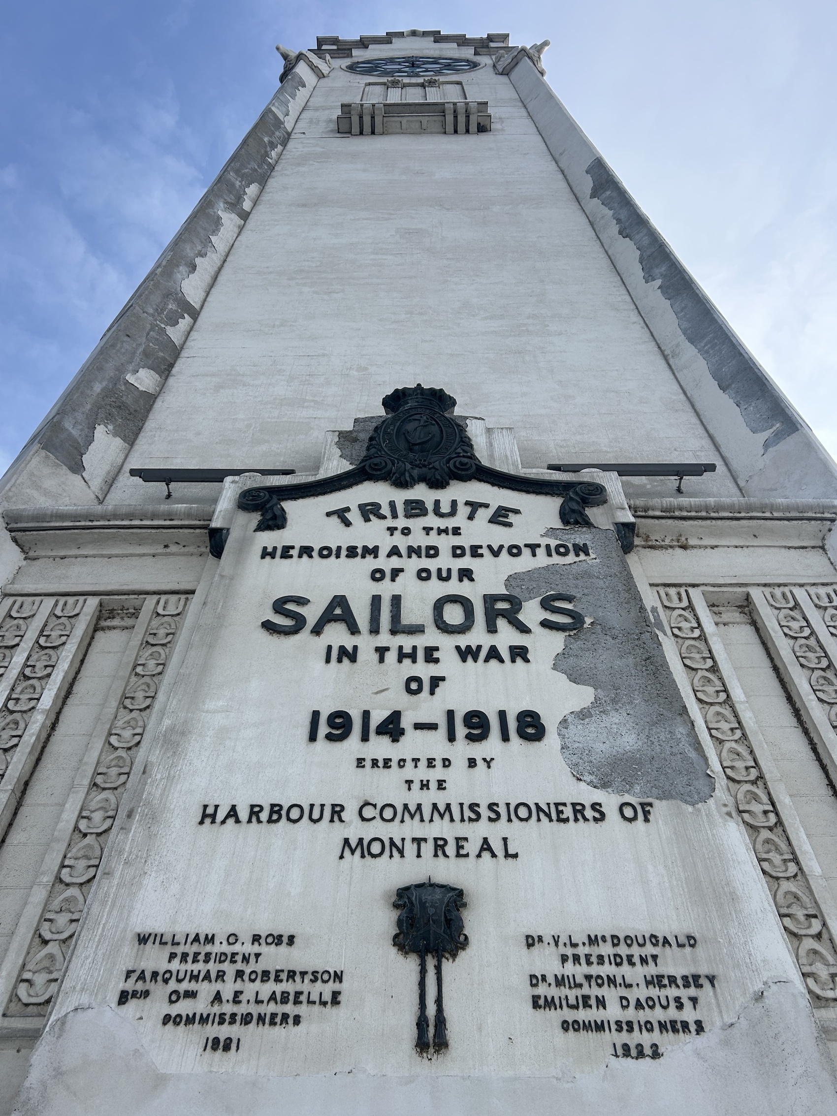 Close up of the Harbour Commissioners of Montreal plaque. Visible on both the lower left and right hand corners are the names of the President and commissioners